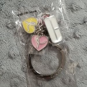 Clinique breast cancer keychain